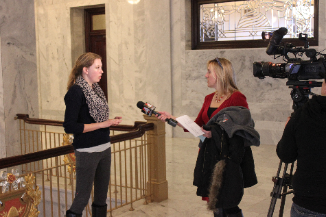 Courtney Dean being interviewed by a local TV station at the Utah State Capitol
